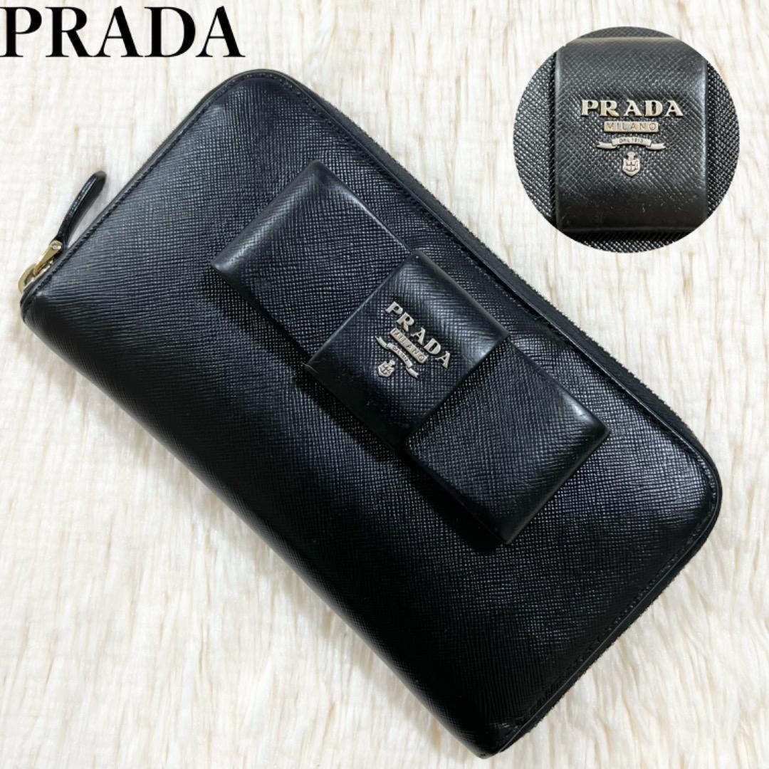 PRADA プラダ 長財布 ラウンドジップ リボン ブラック サフィアーノレザー ゴールド金具 ロゴ刻印 レディース イタリア製