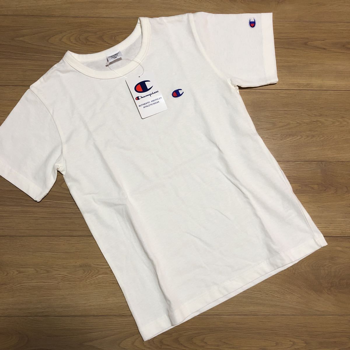 【champion チャンピオン】オフホワイト　ワンポイント　半袖Tシャツ 《新品》150_画像1