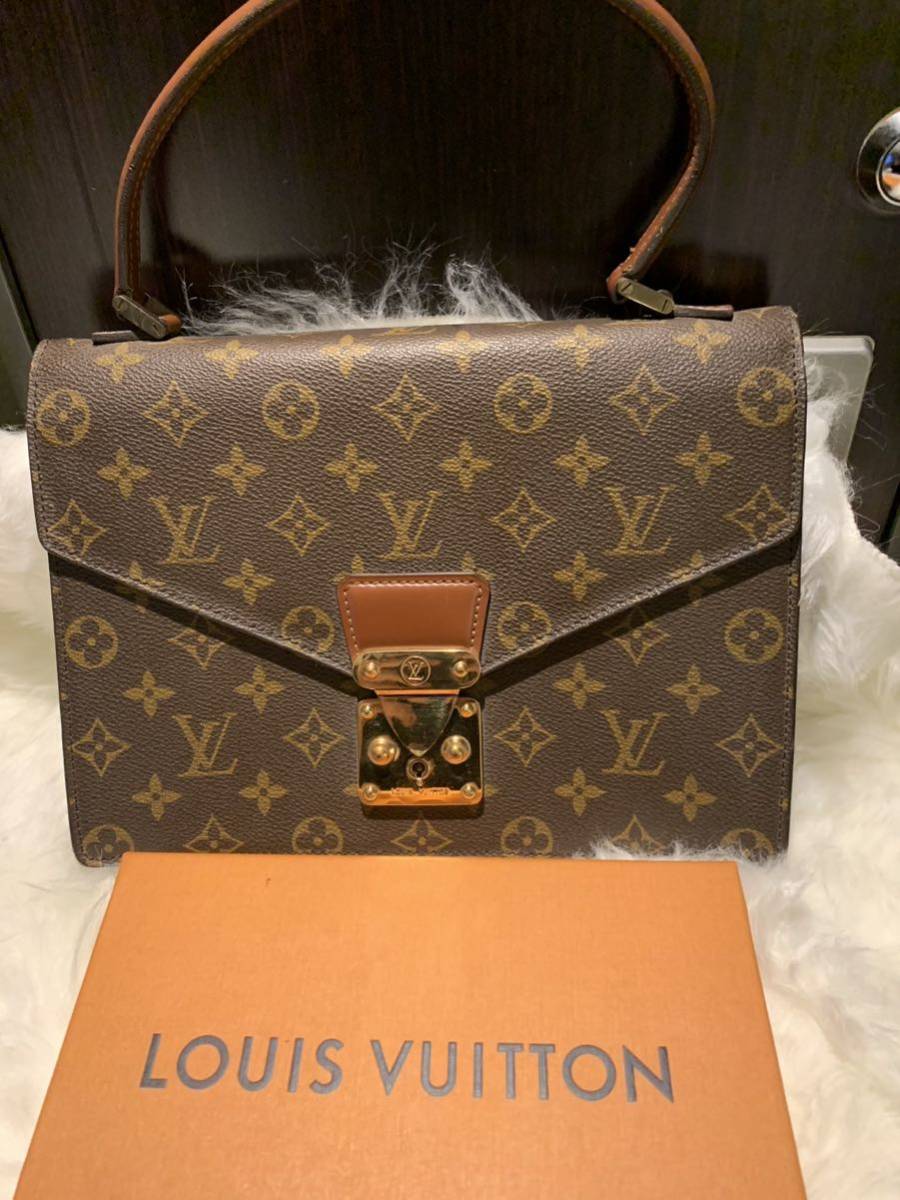 Louis Vuitton - Monogram Macassar Porte Documents Voyage PM - Catawiki