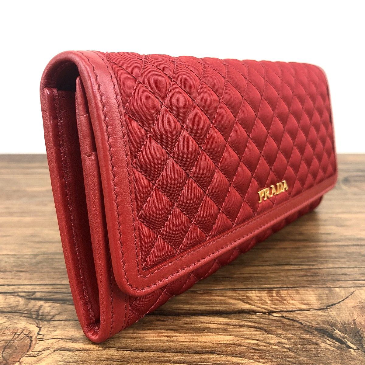 ☆送料無料☆ 未使用品 PRADA 長財布 1M1132 FUOCO レッド 箱付き 487