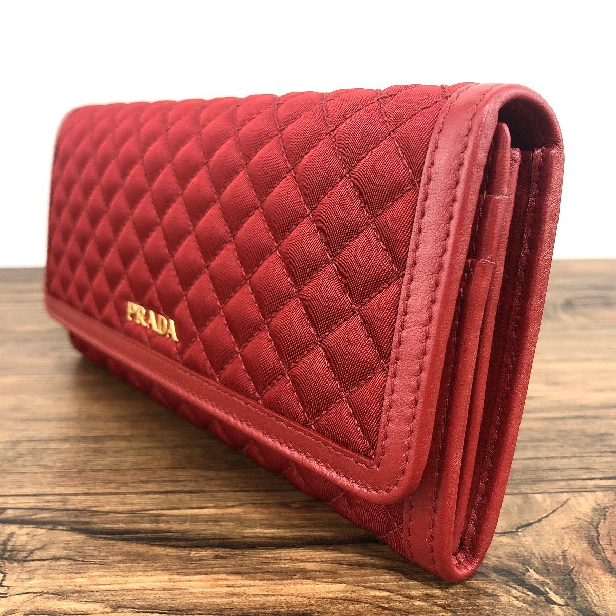 ☆送料無料☆ 未使用品 PRADA 長財布 1M1132 FUOCO レッド 箱付き 487