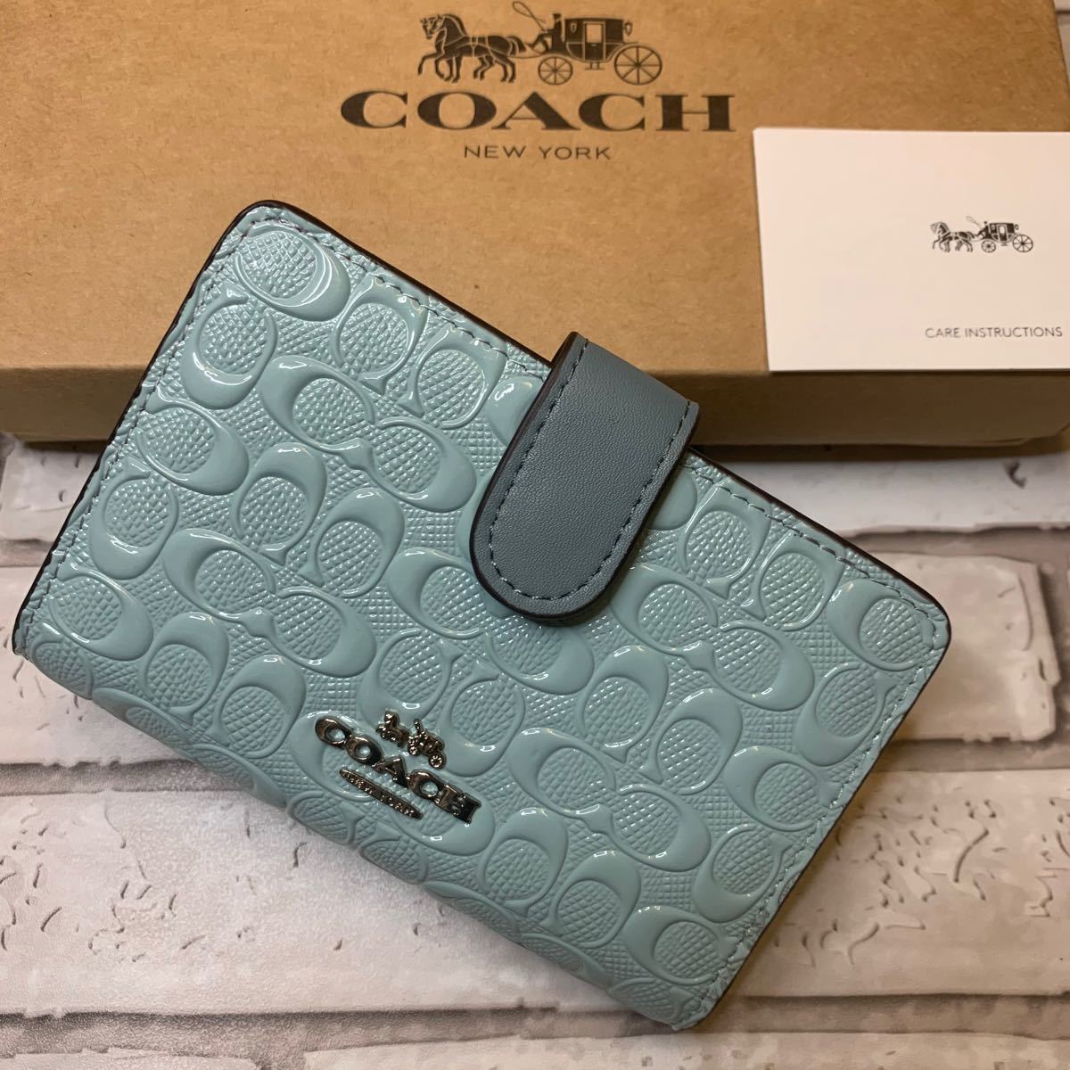 ってしまっ COACH 黒 二つ折り財布 箱付きの通販 by メシコ's shop