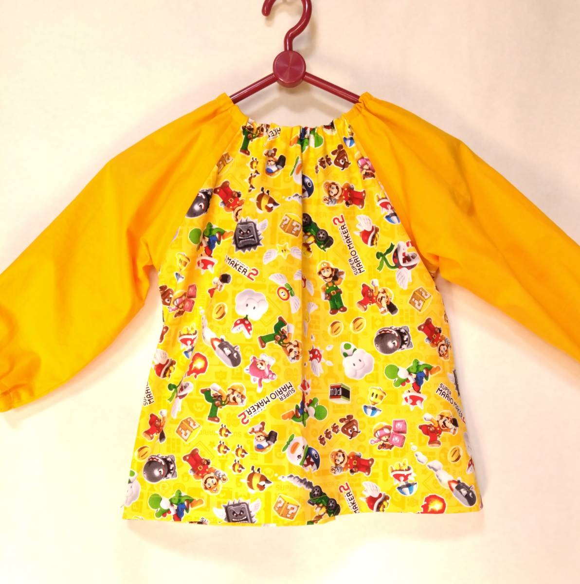 ハンドメイド 子供スモック 110サイズ 黄色 マリオ模様 幼稚園保育園 入園準備 新品 送料無料