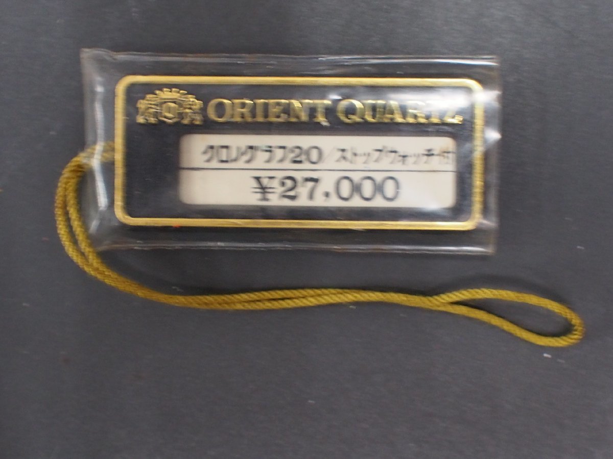 オリエント ORIENT クロノグラフ20 ストップウォッチ付 オールド クォーツ 腕時計用 新品販売時 展示タグ プラタグ Cal: 611118_画像1