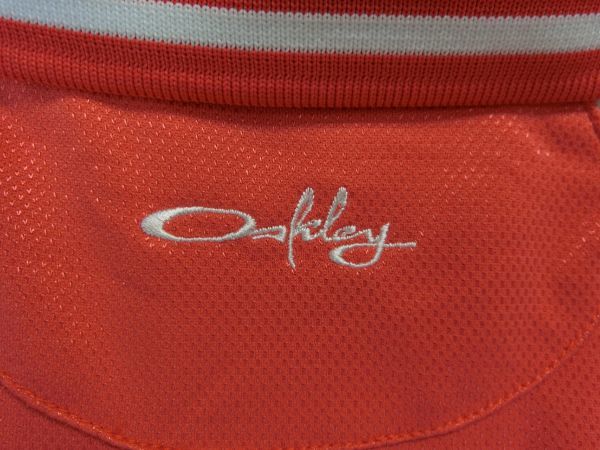 【感謝セール】【美品】OAKLEY(オークリー) ハーフジップアップシャツ 赤 レディース L ゴルフウェア 1903-0124 中古_画像3