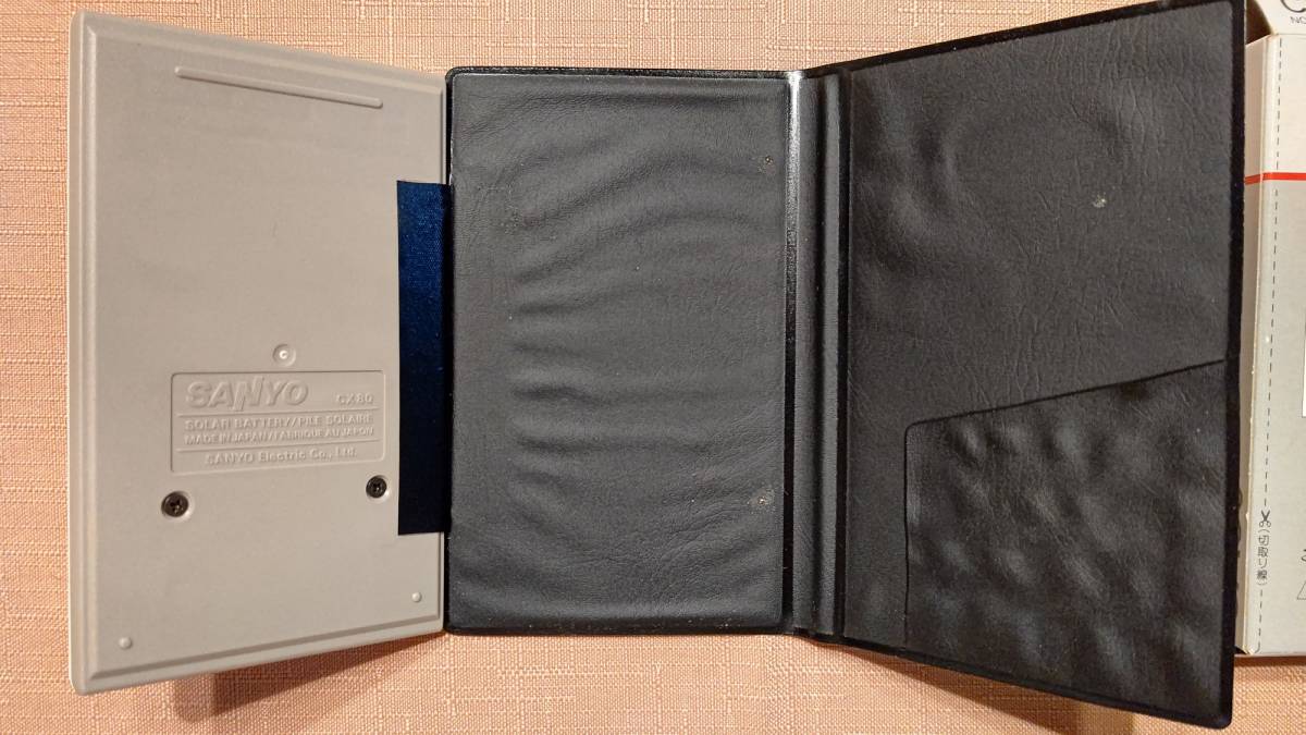  Showa Retro the first period SANYOa malt n calculator (Amorphous Solar Battery) CX80 made in Japan operation OK with cover boxed ( box reverse side . count. way chronicle )