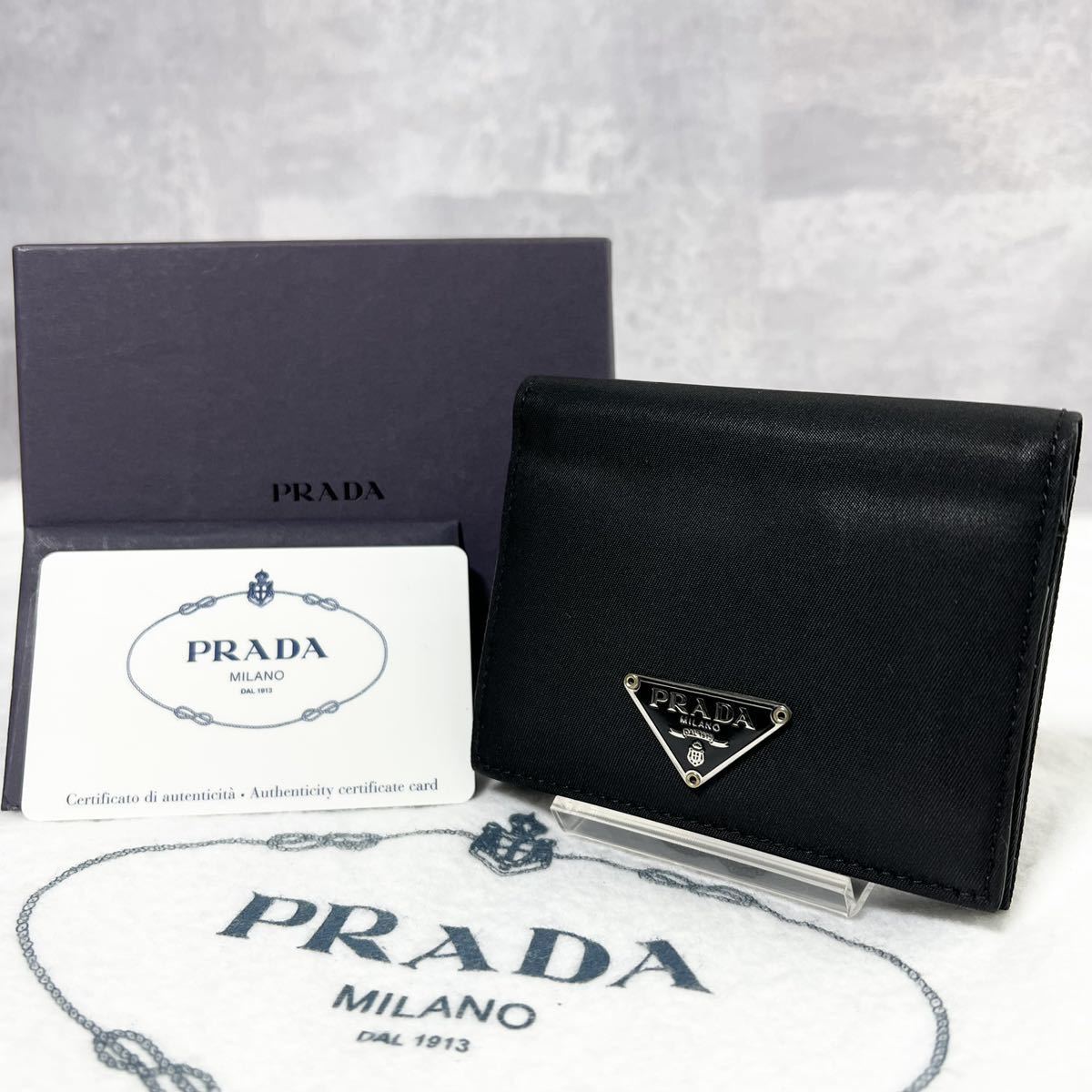 ファッションの-PRADA - プラダ 三つ折り財布 三角ロゴプレート 