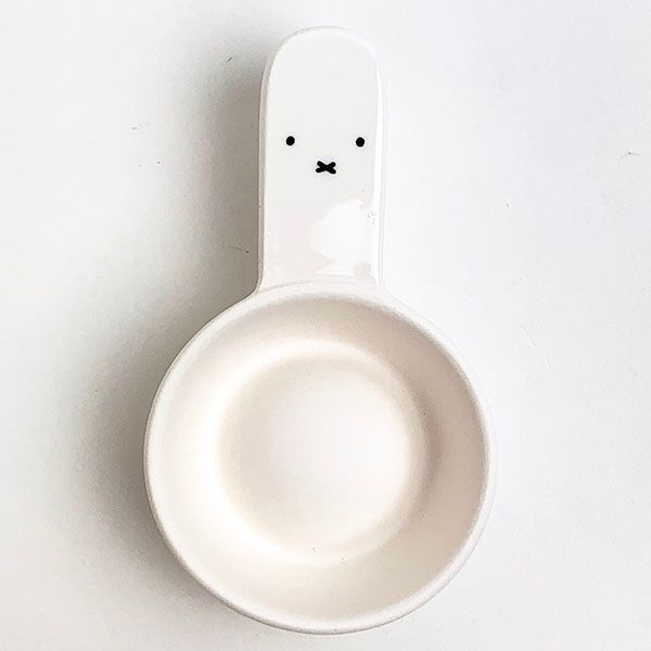  unglazed pottery . spoon . face Miffy 