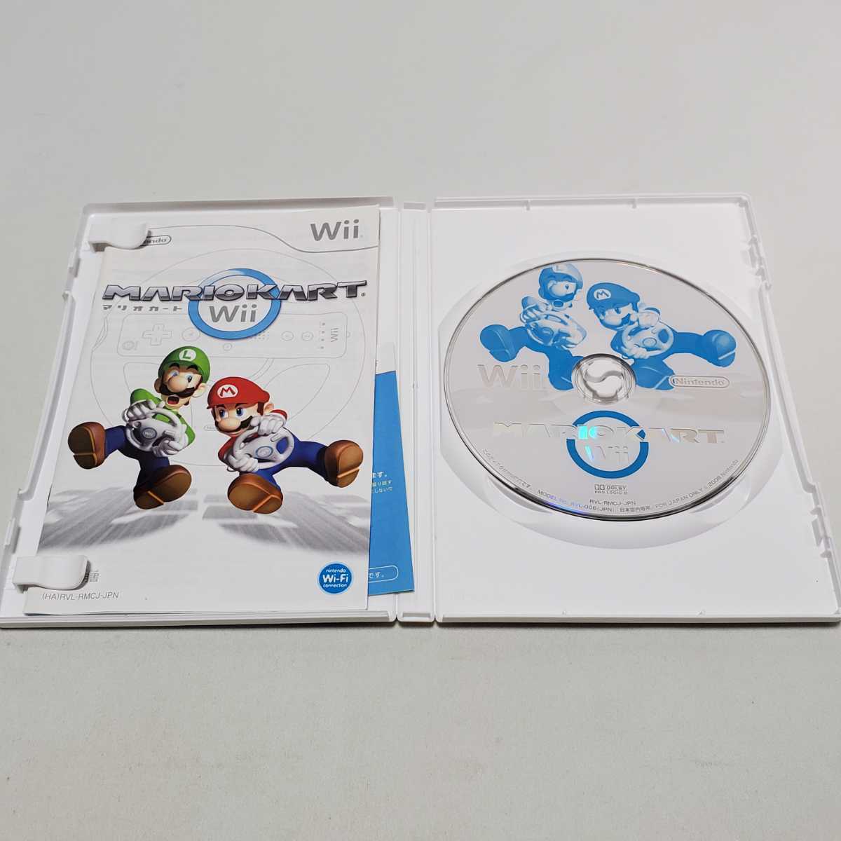 送料無料【Wii　ゲームソフト】マリオカートWii　Wiiハンドル付き　ユーズド品