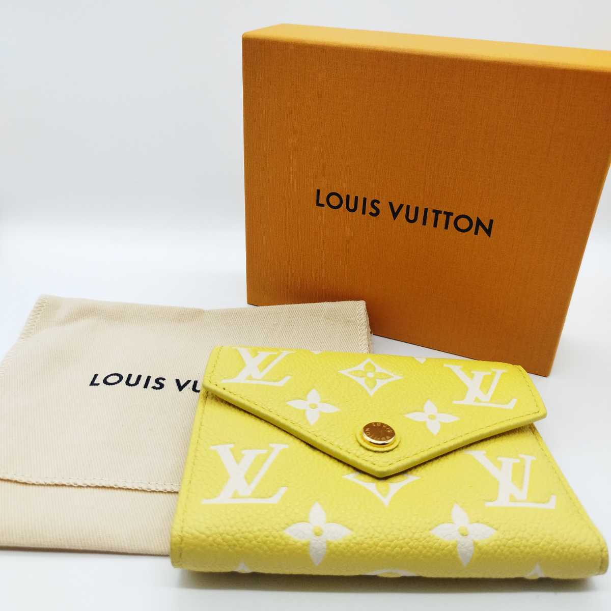 ルイヴィトン LOUIS VUITTON 財布 三つ折り ポルトフォイユ ヴィクトリーヌ モノグラム アンプラント イエロー ホワイト 黄色 白  M81428