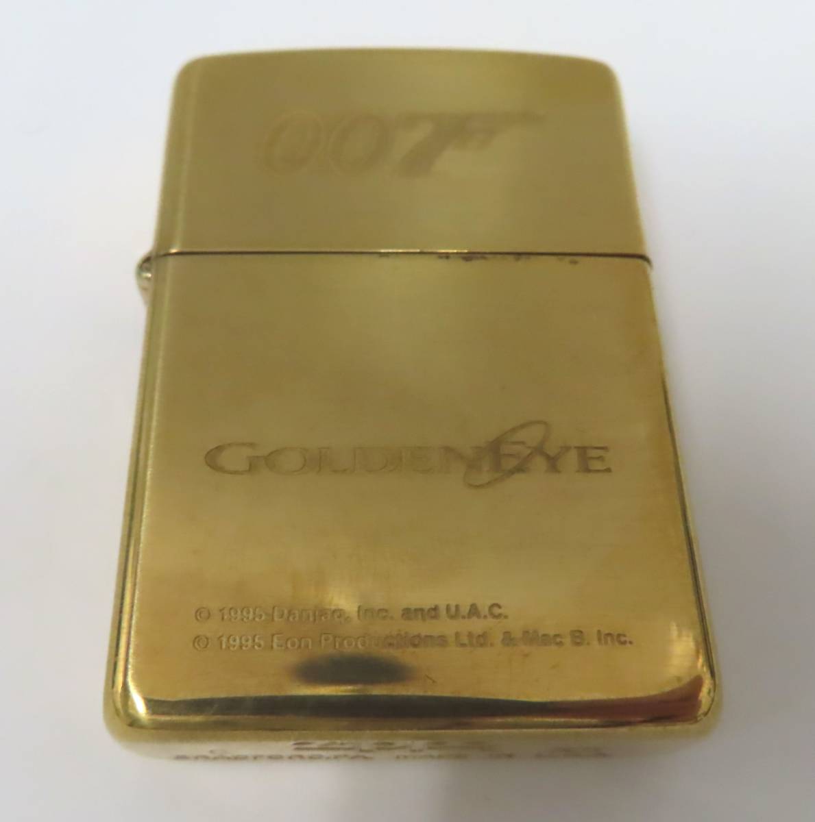 #64387 希少 美品 ZIPPO ジッポー 007 GOLDEN EYE C ゴールド系 現状品 コレクター の画像1