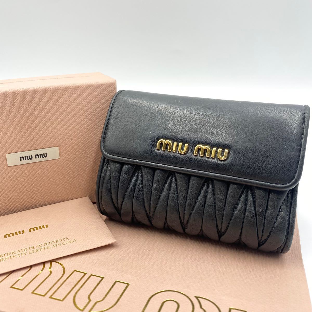 miumiu 二つ折り財布 黒×ゴールド | myglobaltax.com