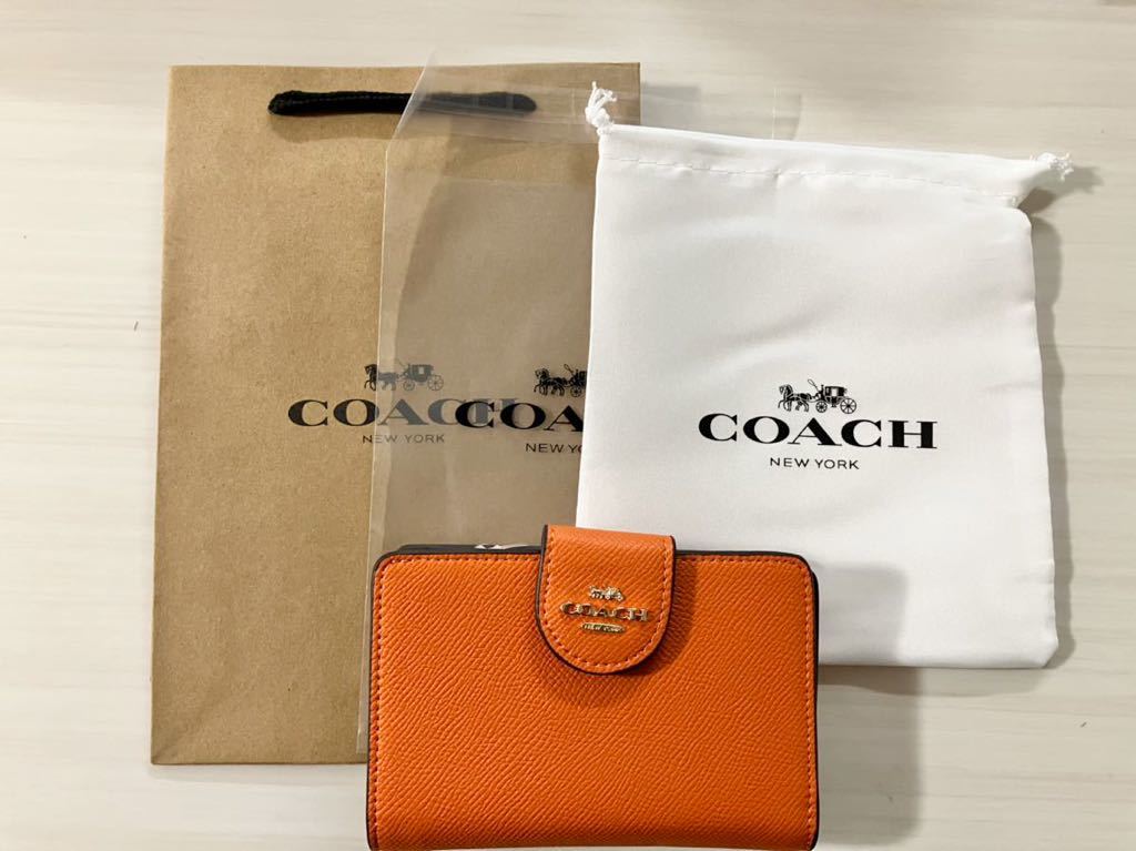 COACH コーチ　財布　二つ折り財布　レディース　新品　未使用　オレンジ