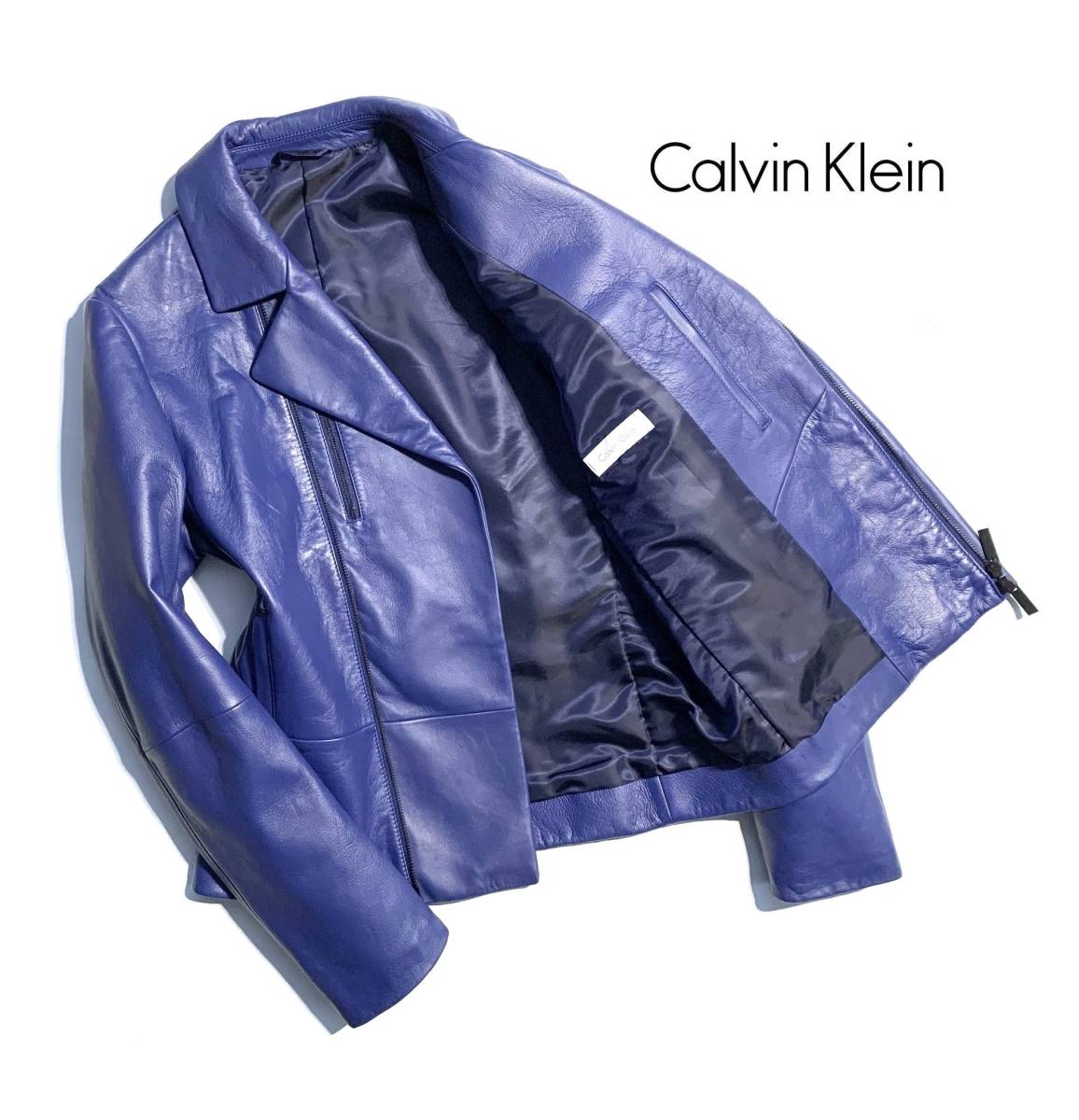 極美品【定価9.3万】Calvin Klein カルバンクライン レザー ライダースジャケット 38 メンズ 羊革 美シルエット ネイビー 刻印ダブルジップ_画像1
