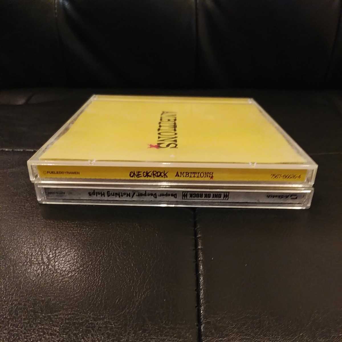 【送料無料・まとめ売り】ONE OK ROCK CDシングル+アルバム Deeper Deeper/Nothing Helps AMBITIONS 2タイトルセット ワンオクロック