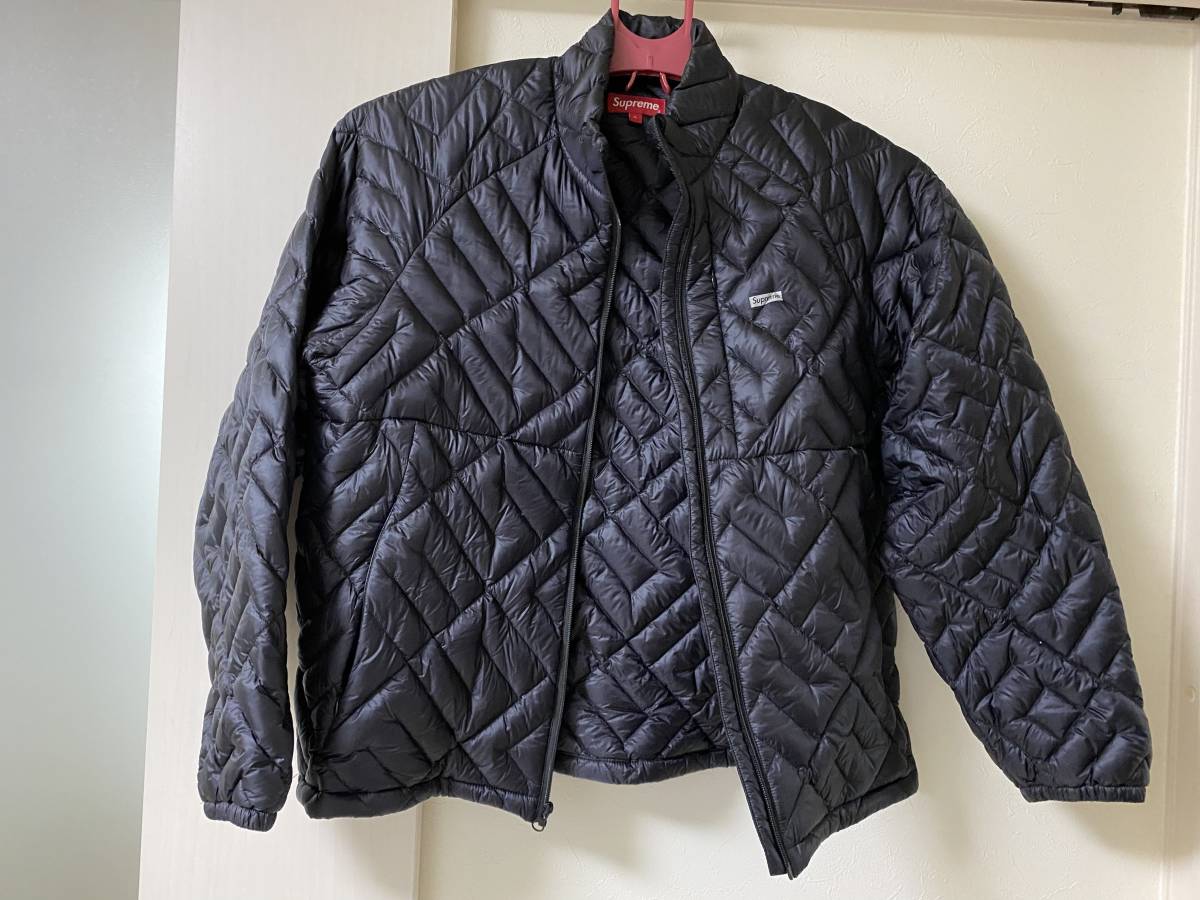 Supreme Spellout Quilted Down Jacket | sweatreno.com