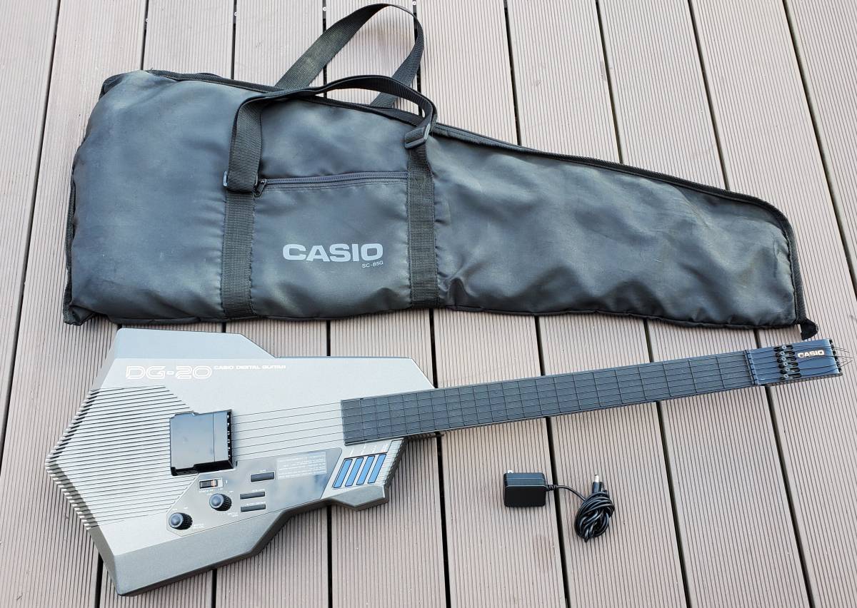 返品送料無料】 動作確認済 CASIO 教本 電子ギター 弦 ギタースタンド