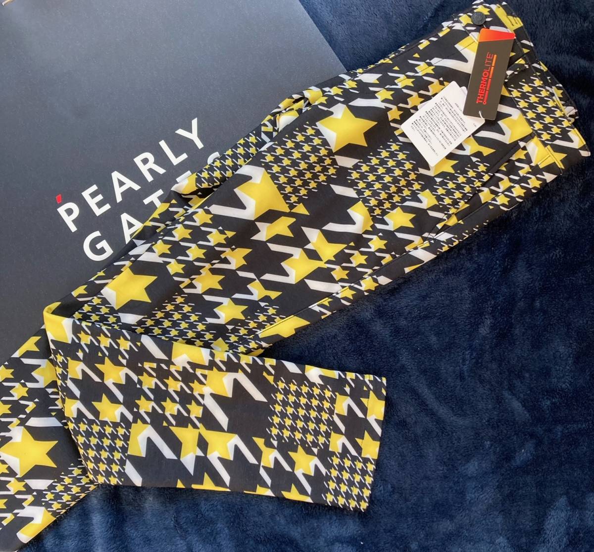 安い割引 新品 パーリーゲイツ BUNNY JACK GATES PEARLY ロングパンツ(5)サイズL/黄 星柄千鳥プリント サーモライト ジャックバニー 82cm～