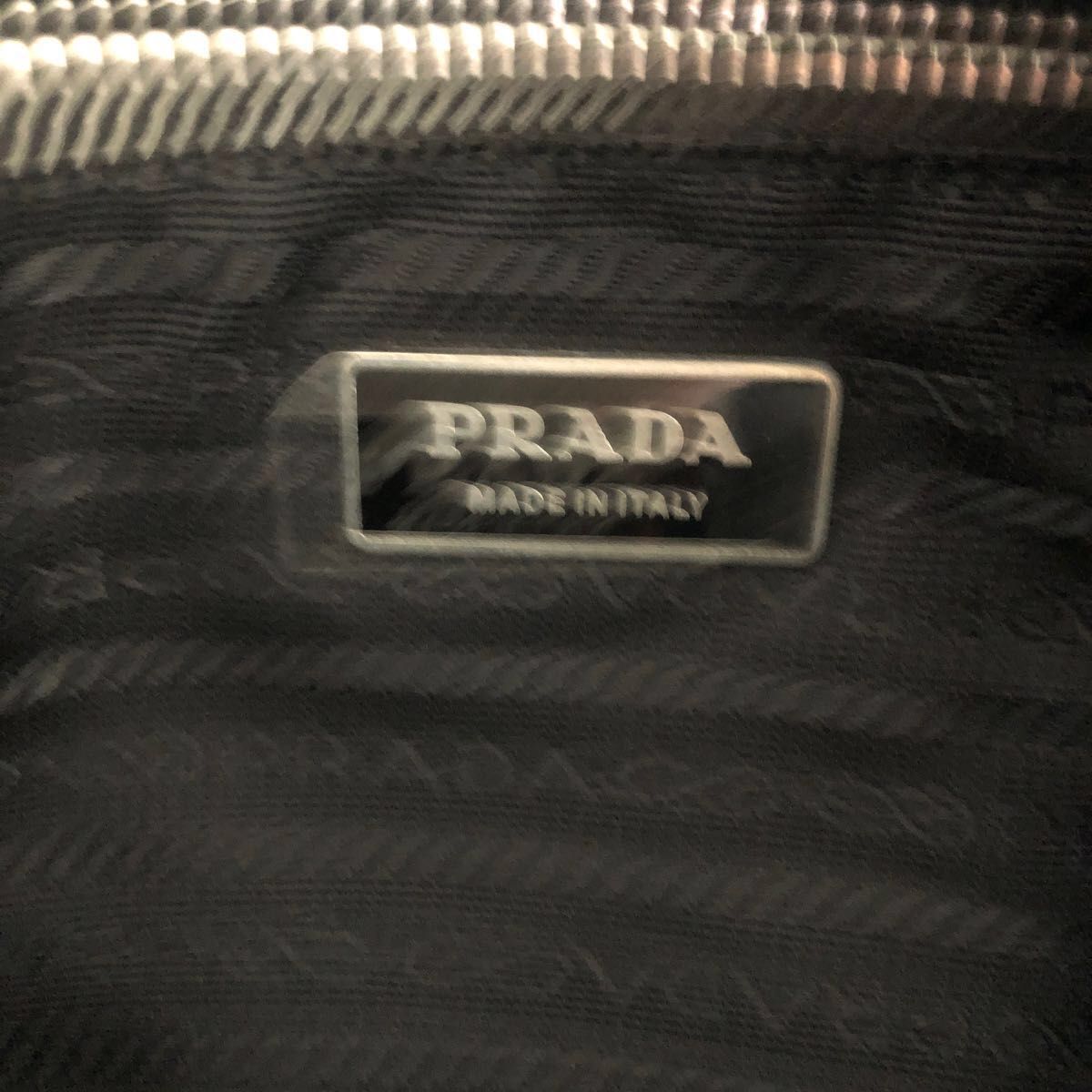 2021最新のスタイル PRADA プラダメタルハンドルロゴナイロン