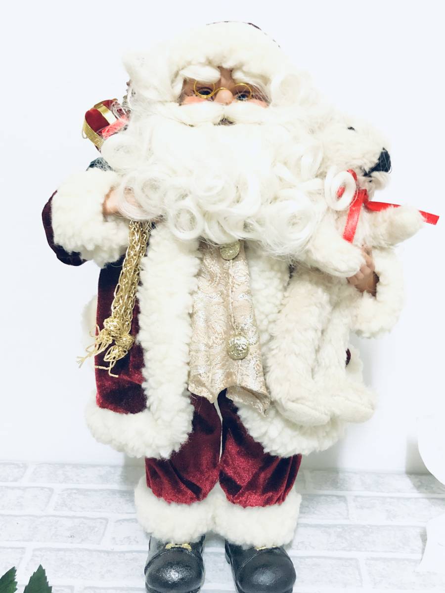 ぬいぐるみを持ちプレゼントを背負ったサンタクロースオブジェ　Christmas　Xmas　サンタクロース置物　サイズ４０cm　サンタクロース人形_画像1