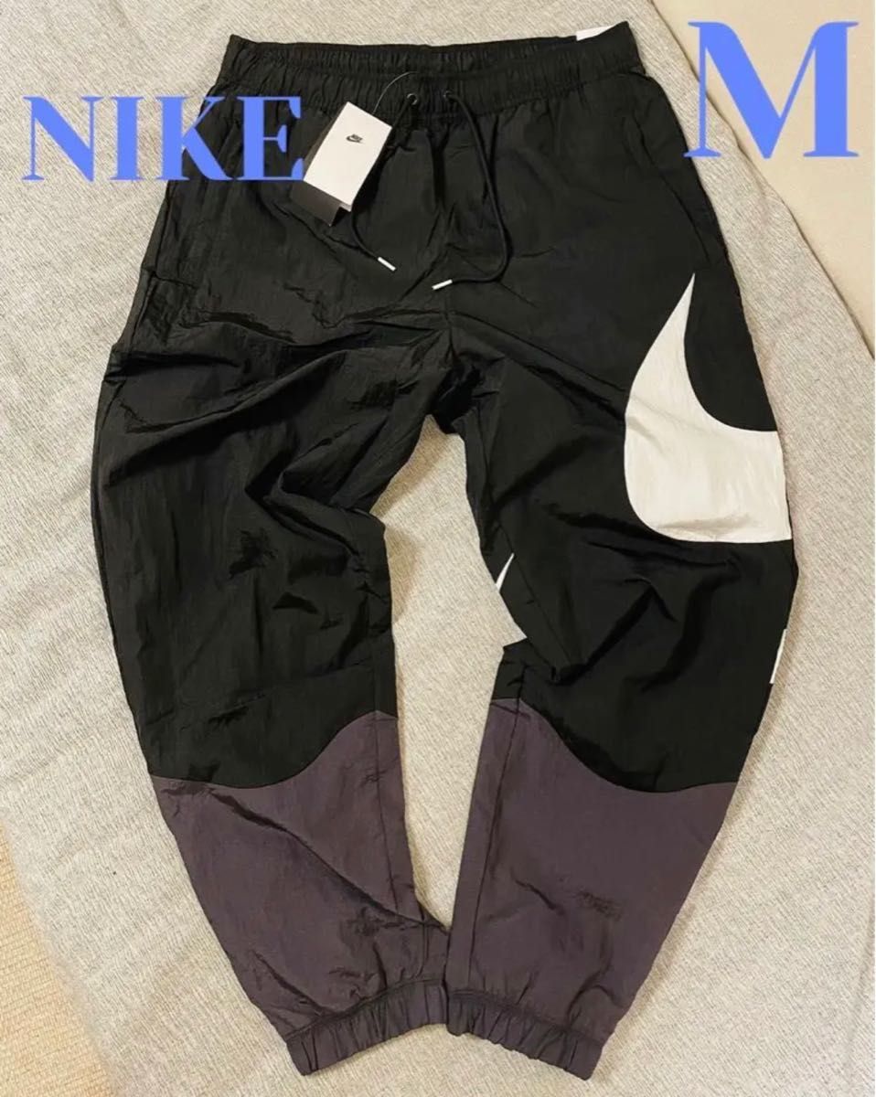 新品 L NIKE ナイロンパンツ ウーブンパンツ ジョガーパンツ 白 黒