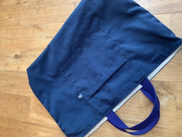  hand made * largish lesson back * simple * robust . navy blue * pocket attaching 
