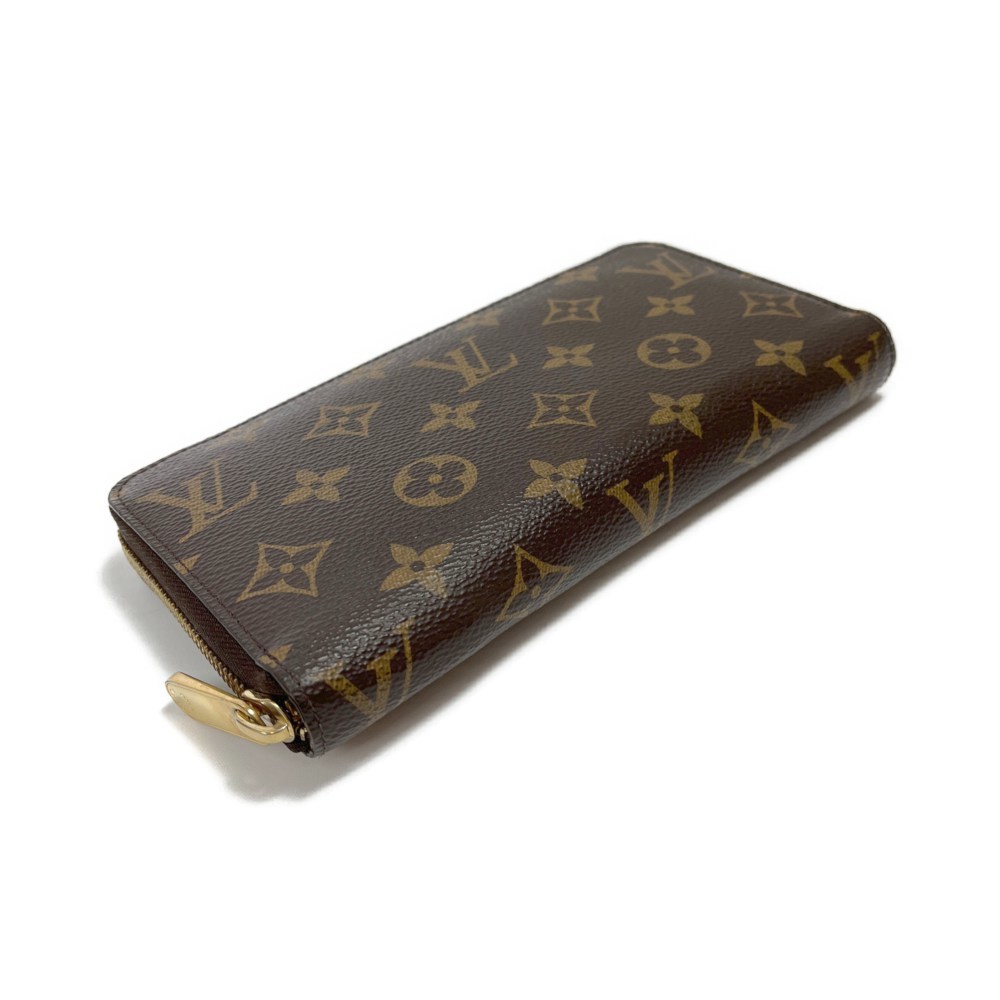 ◆◆ LOUIS VUITTON ルイヴィトン ジッピー・ウォレット モノグラム M42616 ブラウン やや傷や汚れあり_画像3