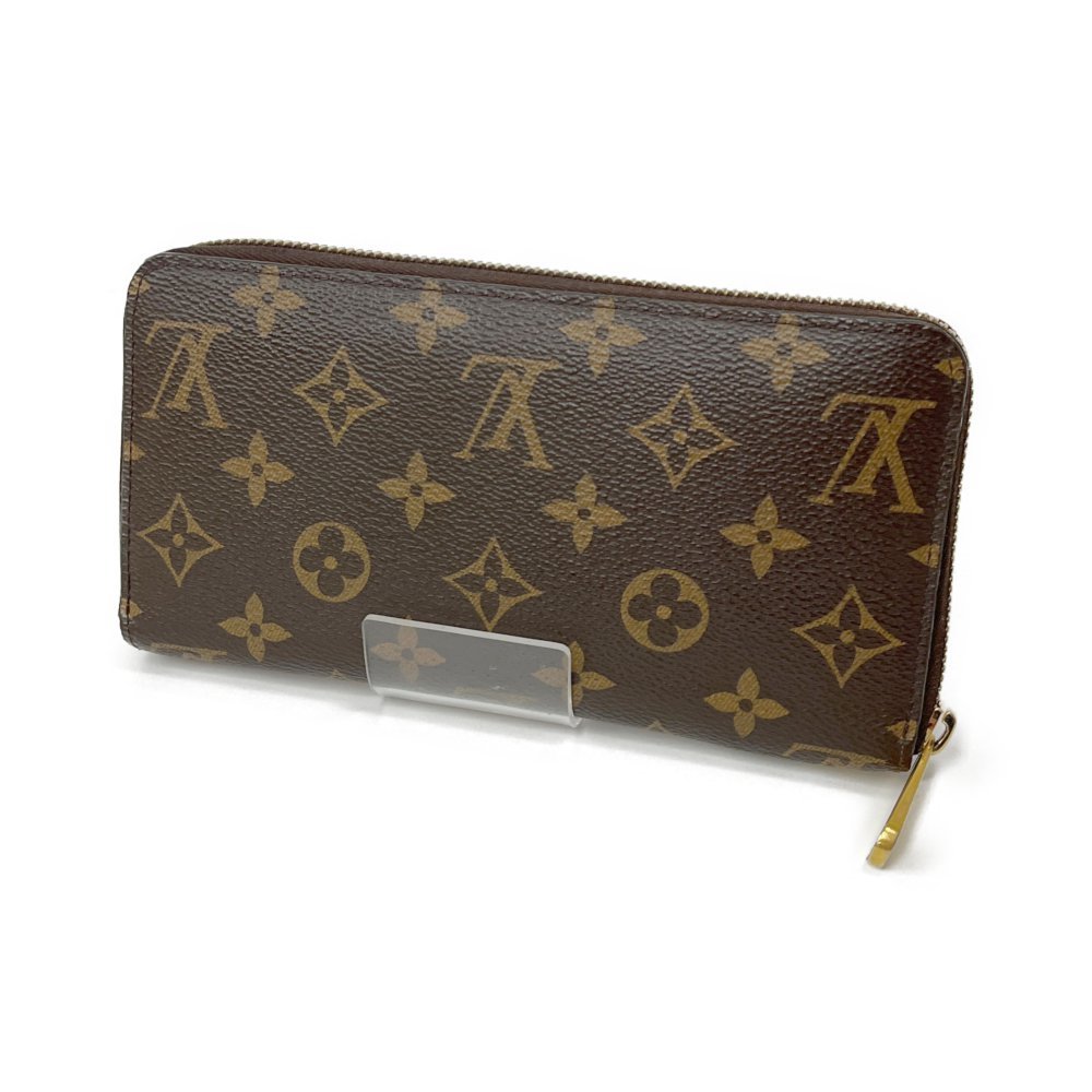 ◆◆ LOUIS VUITTON ルイヴィトン ジッピー・ウォレット モノグラム M42616 ブラウン やや傷や汚れあり_画像1