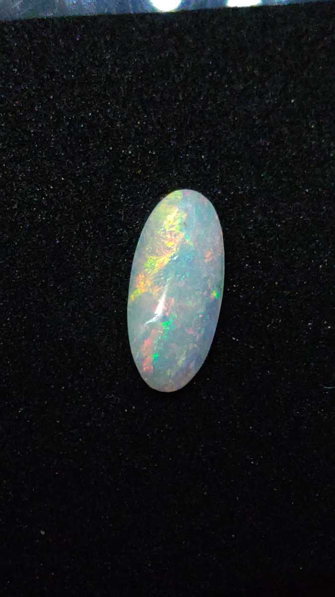 No.506 opal loose 1.58ct 6.7x14.6mm natural stone . white stone ilite sense . color effect silica lamp 10 month. birthstone 