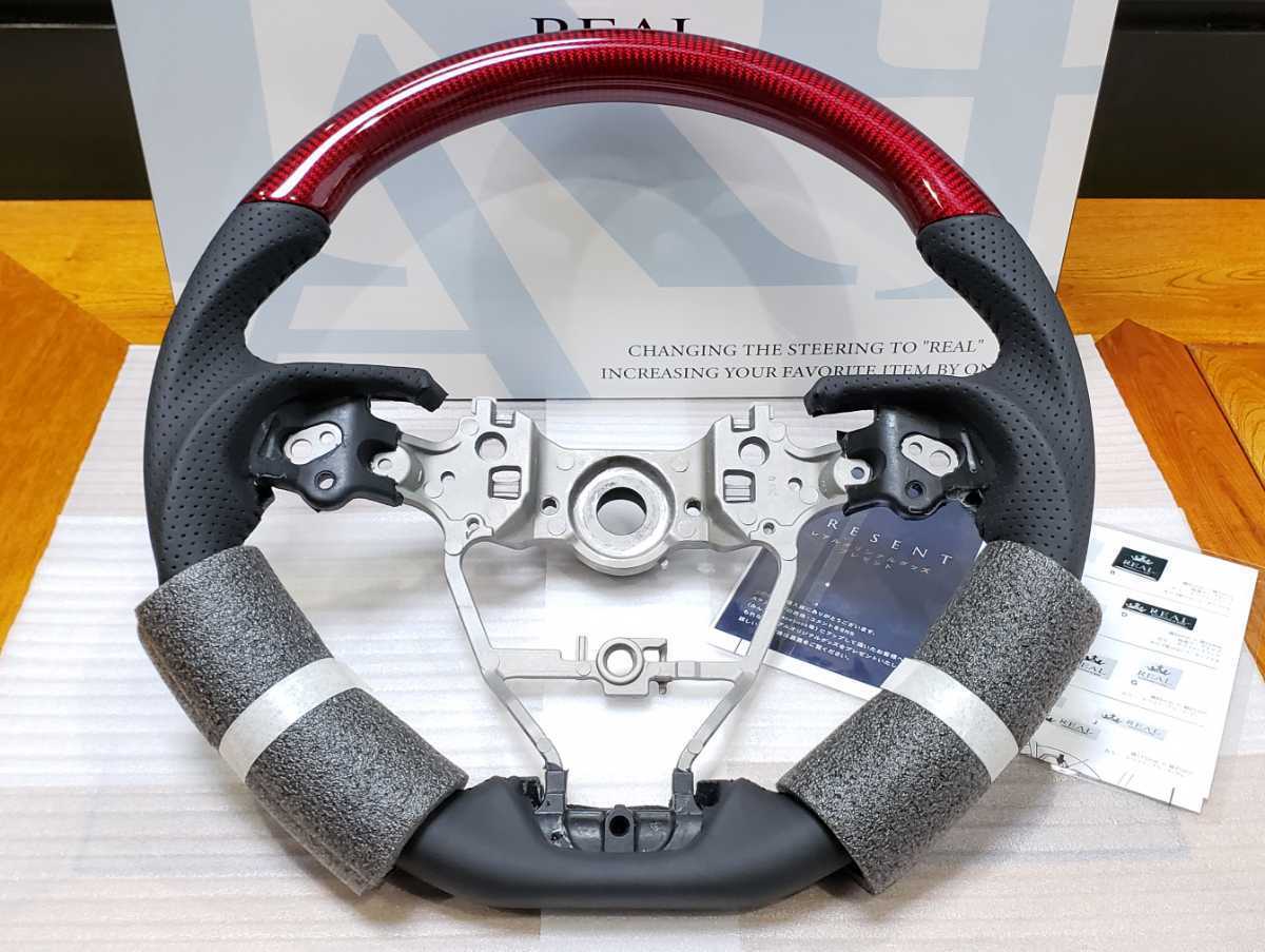 豪華ラッピング無料 カローラスポーツ/ツーリング│50系 REAL│ステアリング│レッドカーボン│210 RAV4│220 カムリ│レアル クラウン│70 ステアリング、ハンドル本体