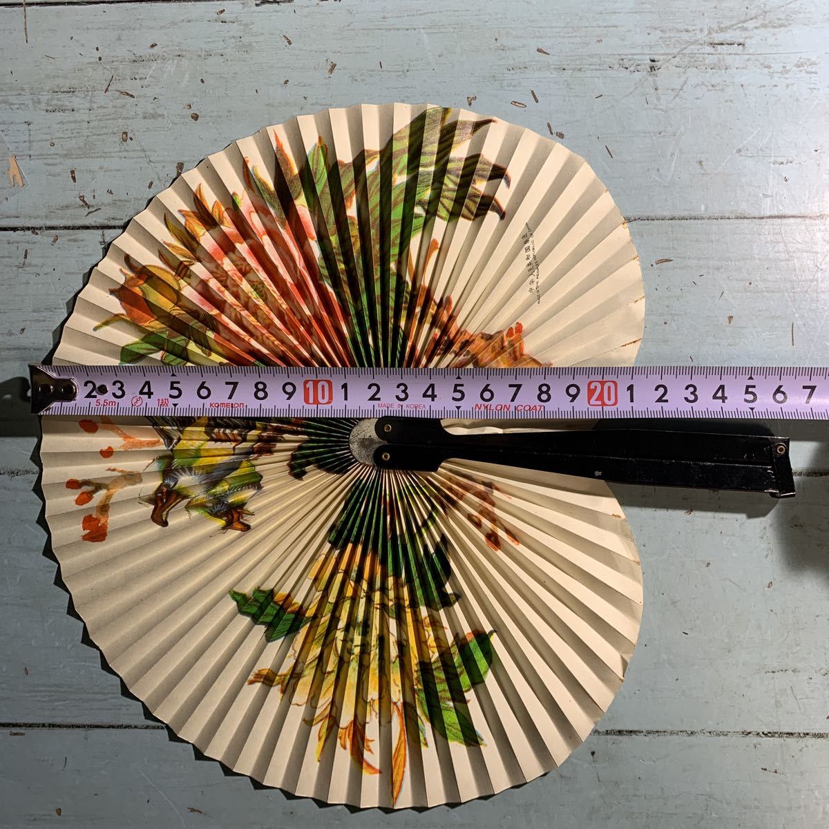  fan Chinese person . also peace country manufacture . bird flower folding .. miscellaneous goods (6372)