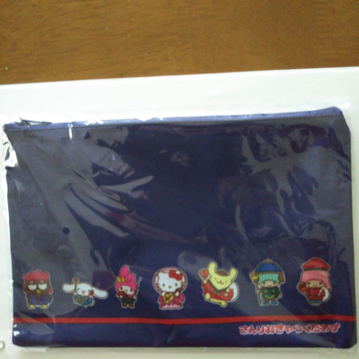 サンリオキャラクターのポーチ 非売品 横235mm×縦約160mm キャラクター七福神、色は紺になります。sanrio