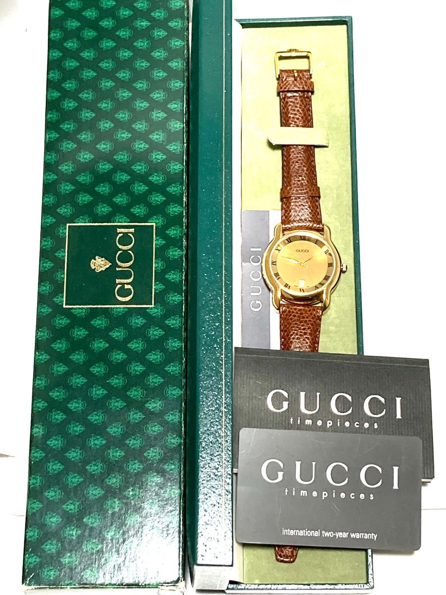 未使用 GUCCI グッチ 電池新品交換済み メンズ腕時計 ゴールド デイト