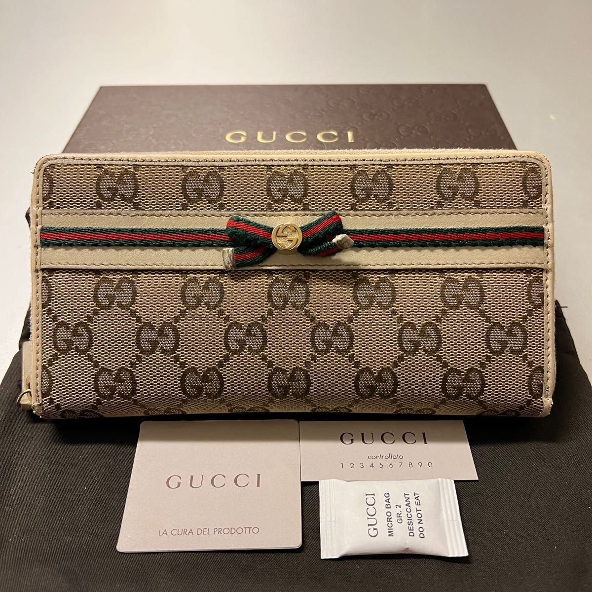 未使用に近い！ グッチ GUCCI 財布 長財布 GGキャンバス シェリー