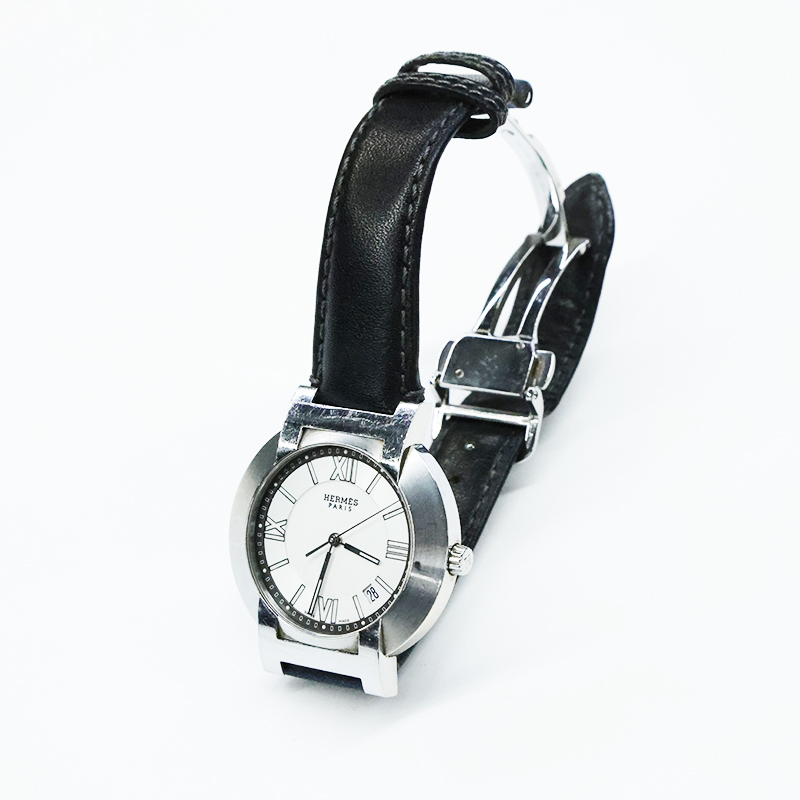 エルメス Hermes 腕時計 ノマード N01.810 ラウンド Hロゴ デイト 白文字盤 SV金具 クォーツ メンズ