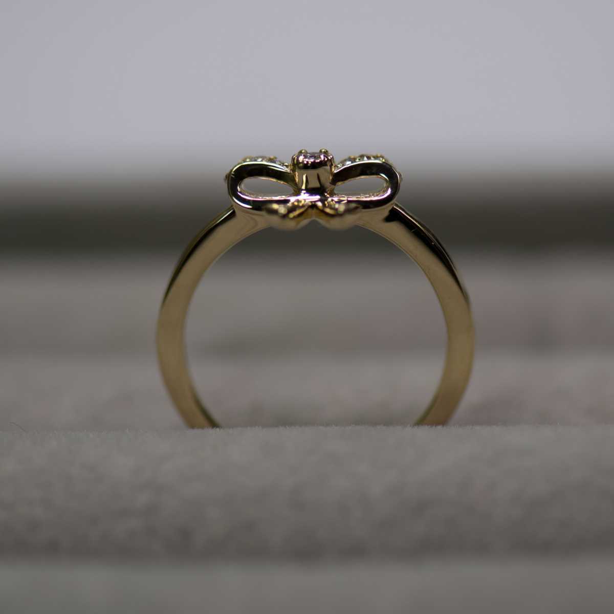 アガット K18YG 0.08ct 9号 リボン ダイヤモンドリング | charcas.gob.mx