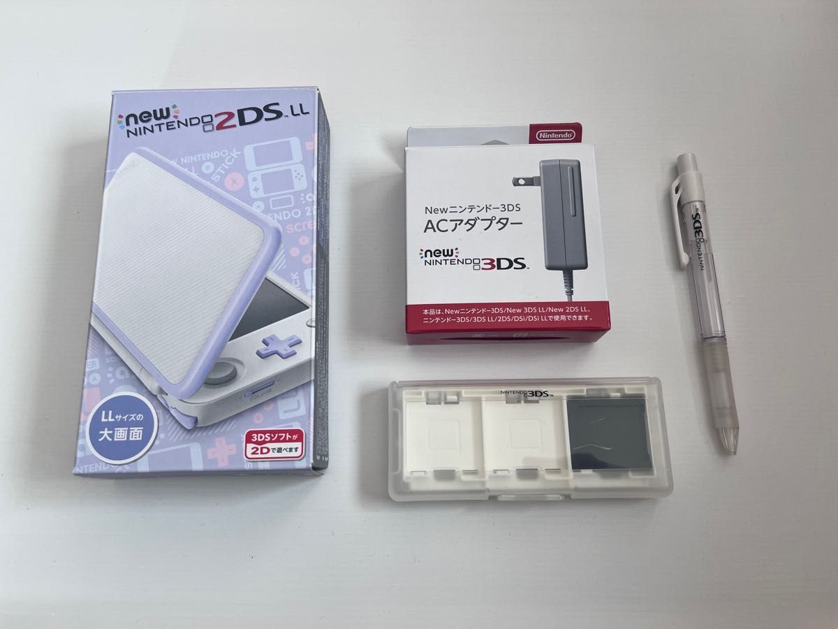 Newニンテンドー2DS LL ホワイト×ラベンダー 純正アダプターと本体