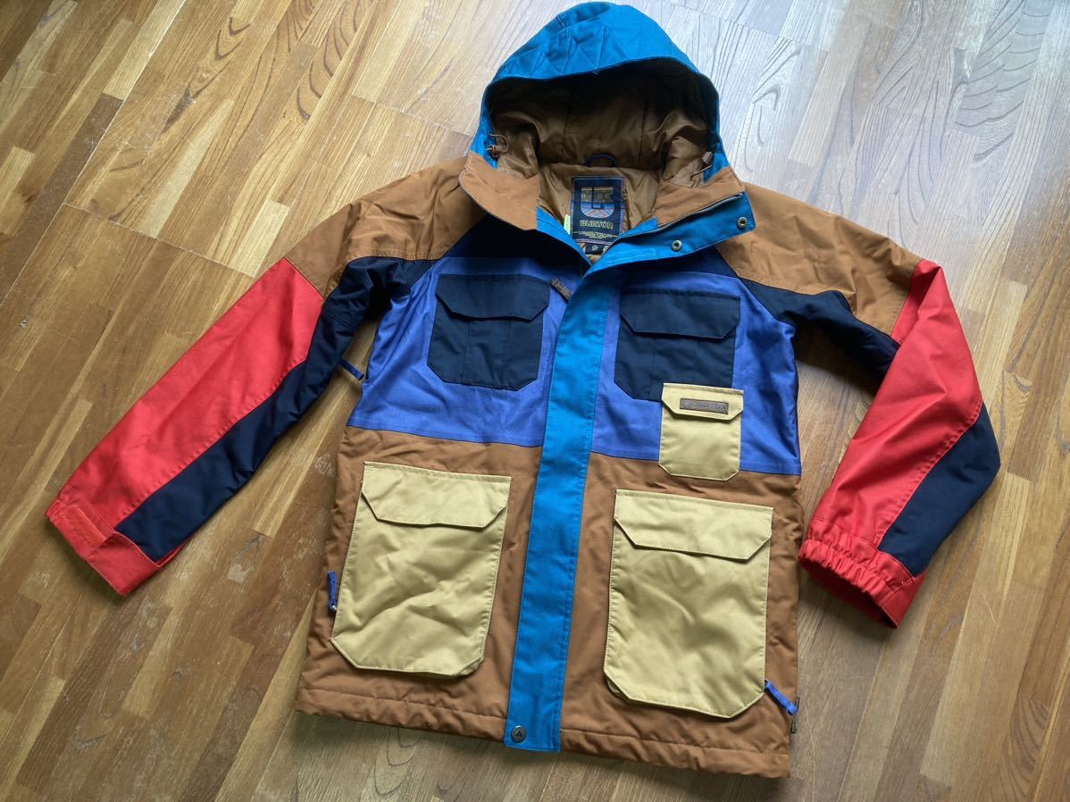 BURTONバートンMB FRONTIER JKメンズS TRUE PENNY MASH UPスノーボード ウエア ジャケット スノボ アースカラー マルチカラー パッチワーク