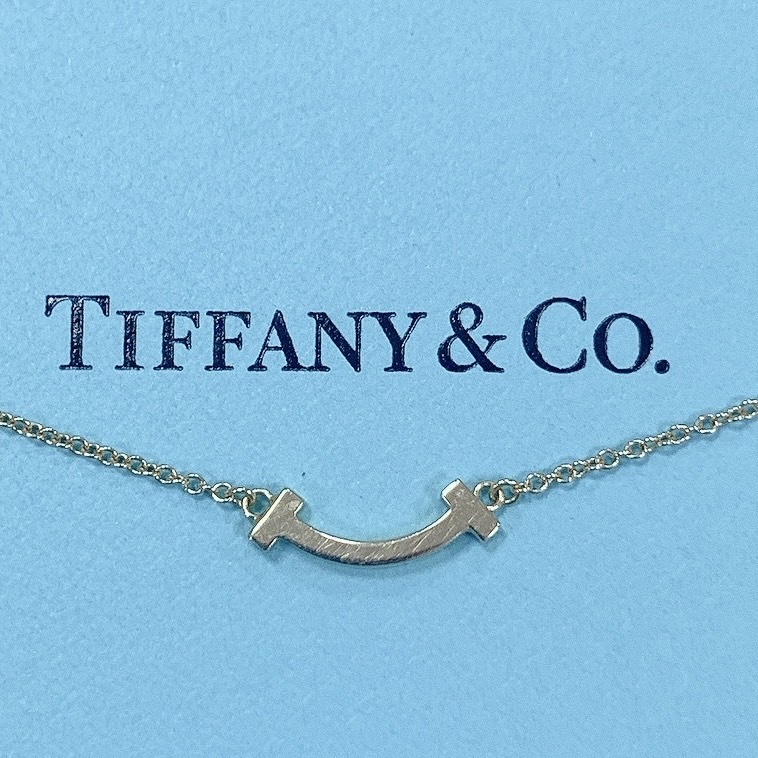 競売 Tiffany Co. ティファニー Tスマイルミニ Au750刻印 ゴールド