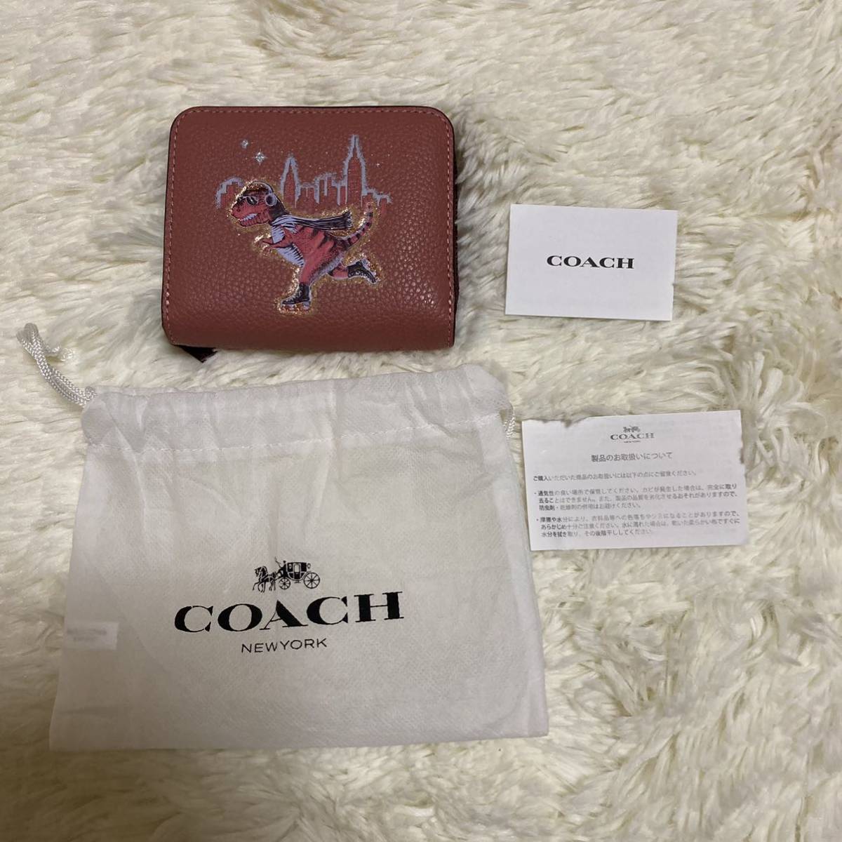 COACH コーチ ︎ブラウン 白 シグネチャー ロゴ 二つ折り財布新商品