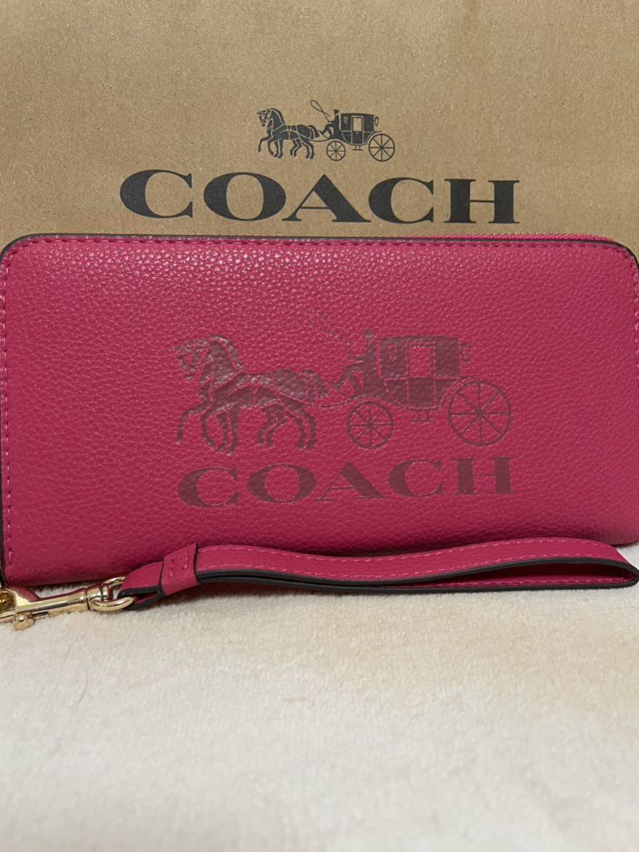 大特価 長財布 アウトレットCOACH 馬車 コーチ ピンク ストラップ 女性用財布 大特価 長財布 アウトレットCOACH 馬車 コーチ ピンク ストラップ 女性用財布
