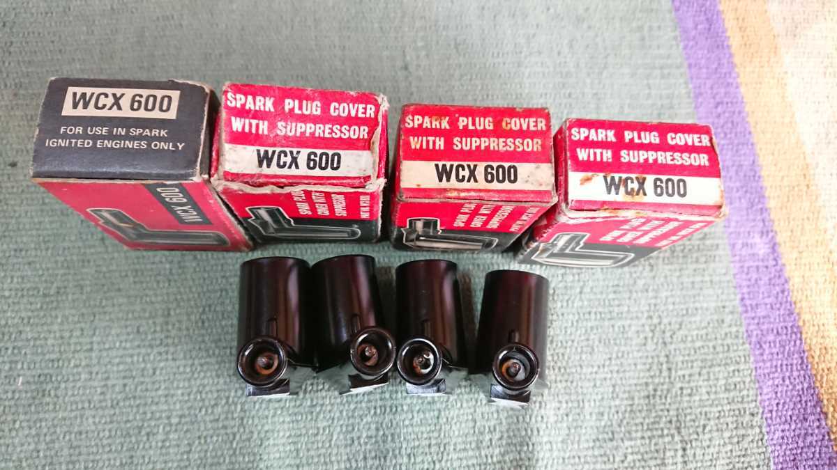  rare Vintage nos dead stock Champion plug cap WCX600 bakelite Old Mini Austin BMC Triumph 