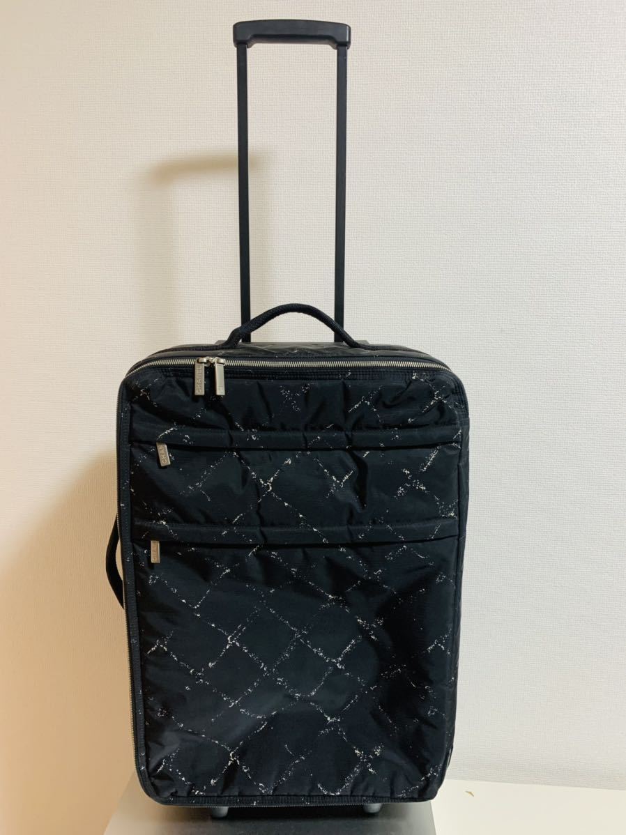 超格安価格 CHANEL シャネル カメリア トラベルケース 希少 ポーチ