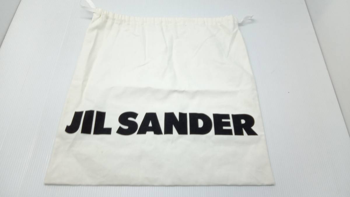 * JIL SANDER Jil Sander FM21 кожа тонкий корпус сумка упаковочный пакет имеется черный через год 