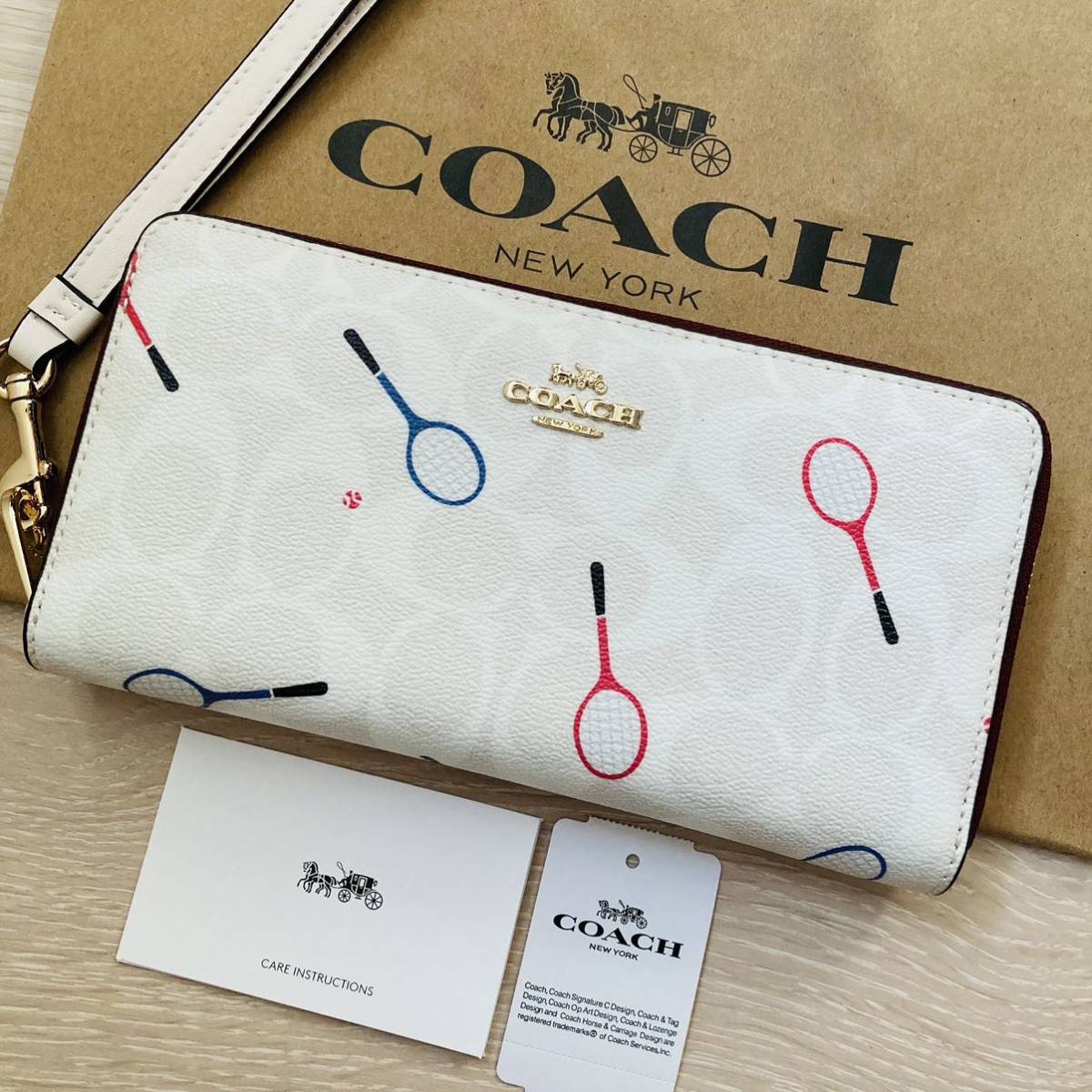 COACH 長財布 リストレット フローラルプリント 花柄 白 ホワイト - 長財布