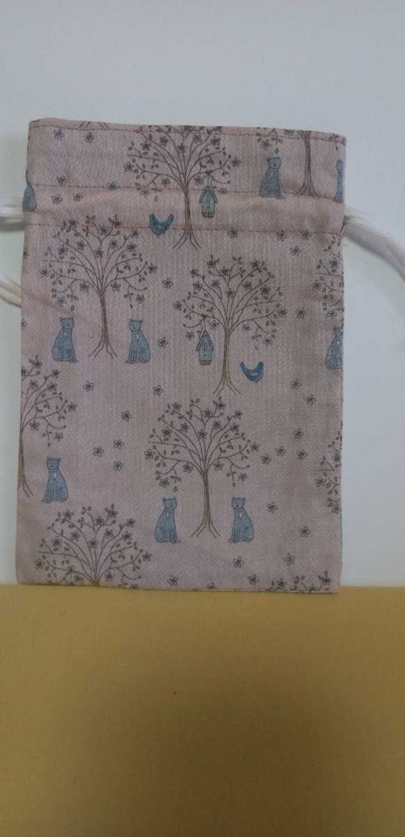 巾着袋　手作り商品　木と猫　中は、星ハンドメイド　オリジナル_画像1