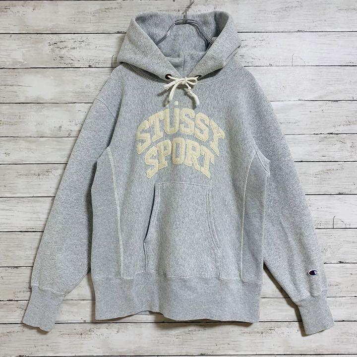 人気コラボ】STUSSY × champion コラボパーカー センターロゴ 即完売