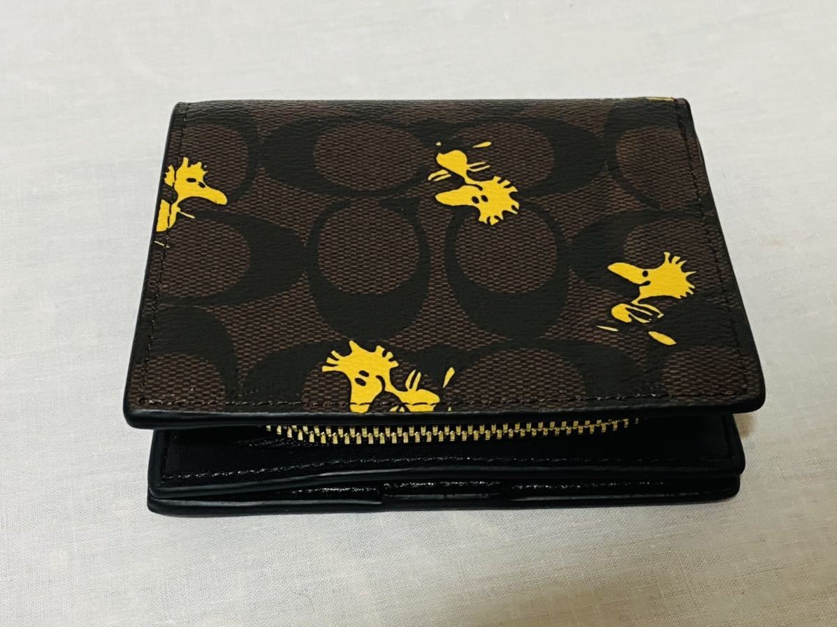 COACH×PEANUTS スヌーピーコラボ スナップウォレット シグネチャー