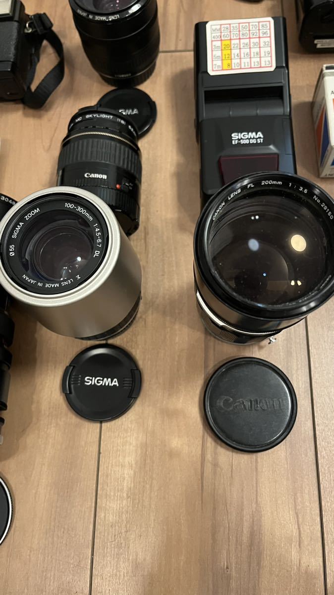  camera Canon MINOLTA OLYMPUS PENTAX Ricoh single‐lens reflex compact camera video camera lens Junk 30 point . summarize 