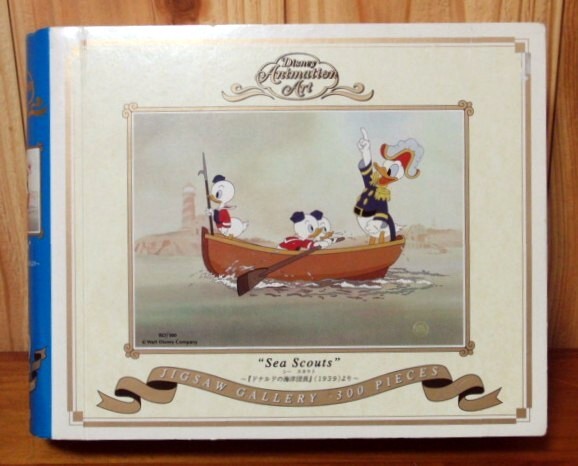 (中古) ジグソーパズル ディズニー "Sea Scouts" シー スカウト 『 ドナルドの海洋団長(1939)より』 本型・ブック型 300ピース の画像1